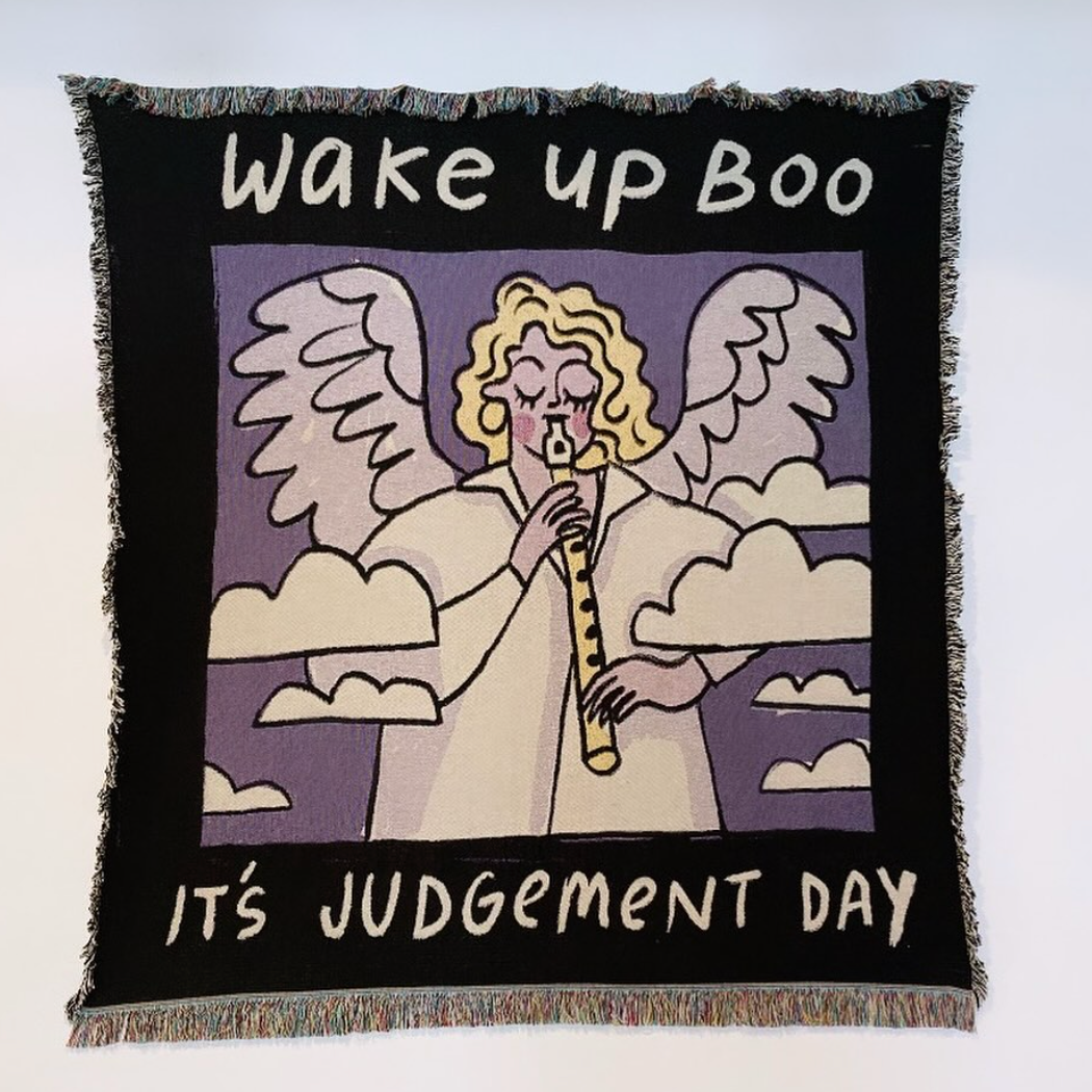 Blanket with an angel design and text 'Wake up Boo, It's Judgement Day' on a white background